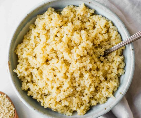 Perfectly fluffy quinoa in a bowl with a fork.