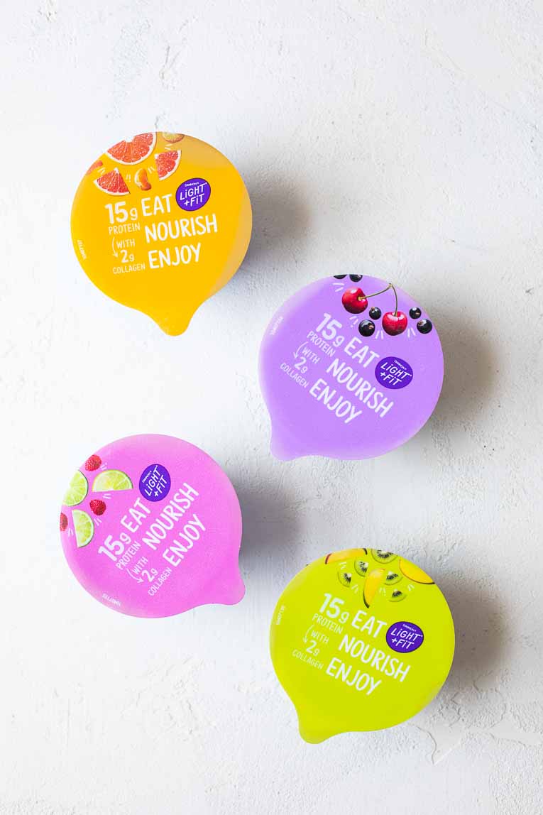 Light + Fit yogurt cups on a white background.