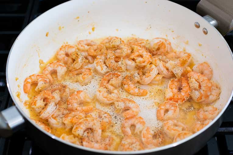 Lemon Garlic Shrimp cooking in a saucepan.