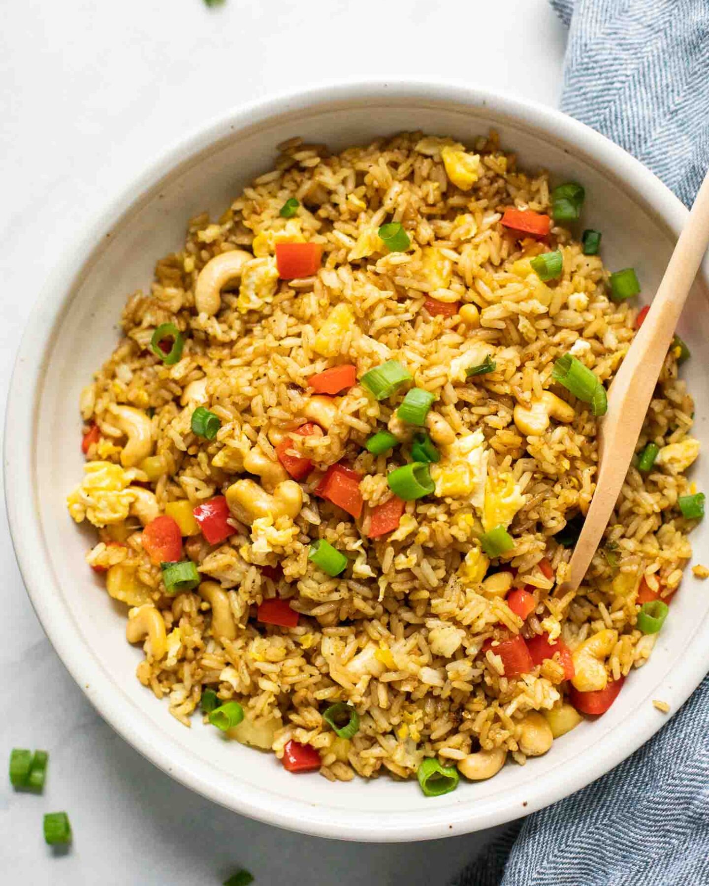 Top shot of Thai Pineapple Fried Rice with a blue napkin.