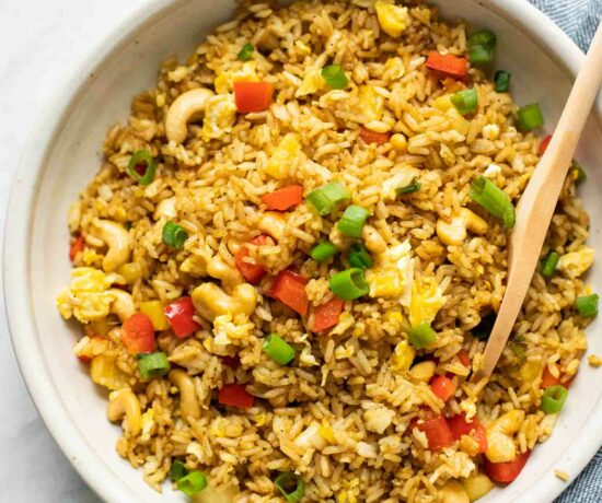 Top shot of Thai Pineapple Fried Rice with a blue napkin.