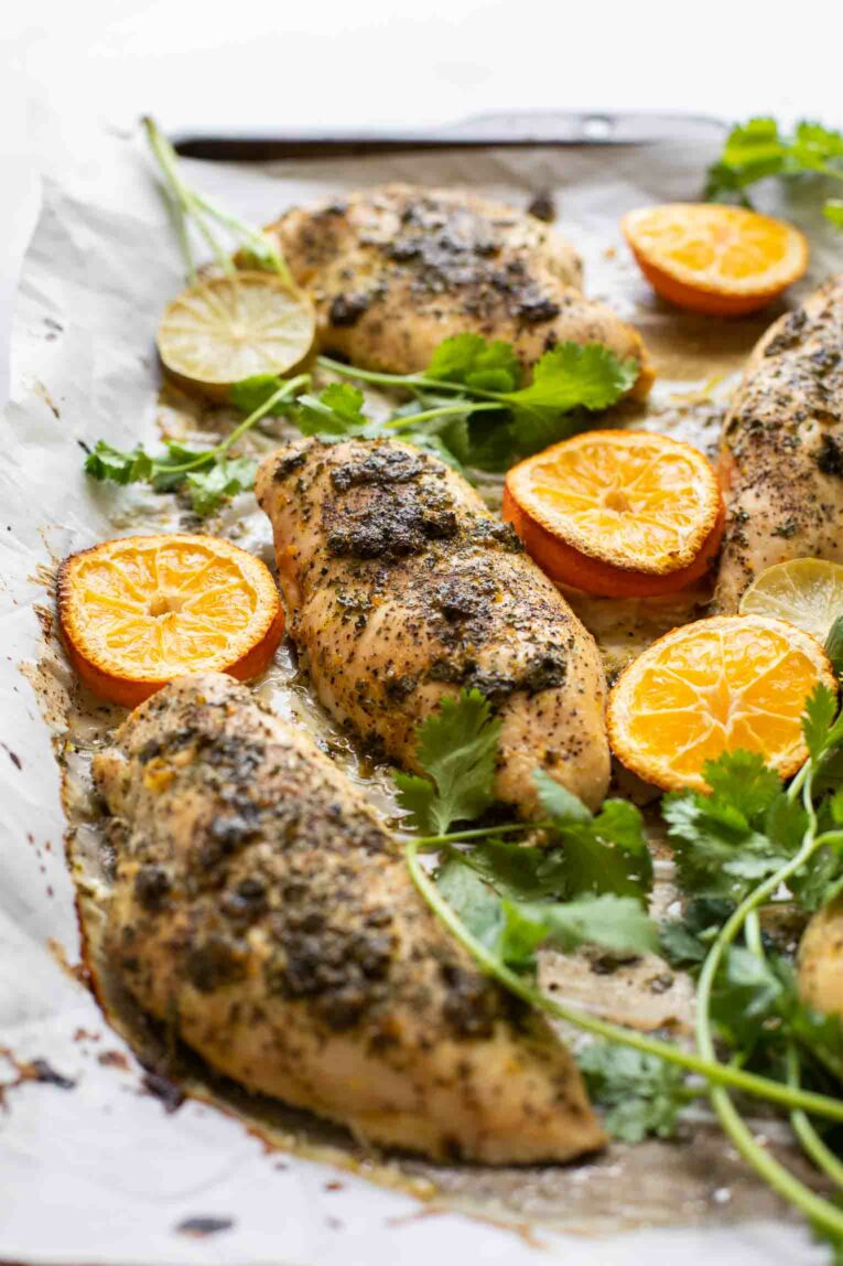 Close up of Cuban Mojo Chicken on a baking sheet.