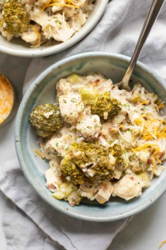 Close up of Crockpot Chicken and Rice in a cozy bowl.