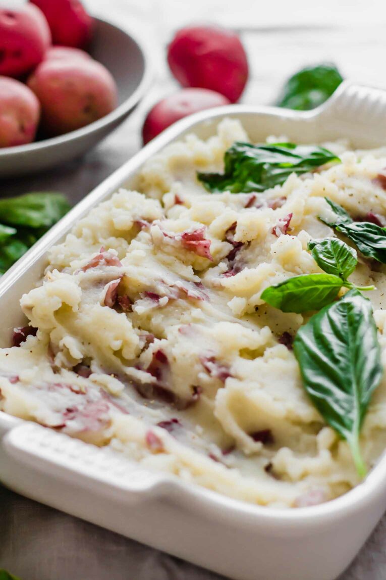 Angled shot of Creamy Garlic Mashed Red Potatoes.