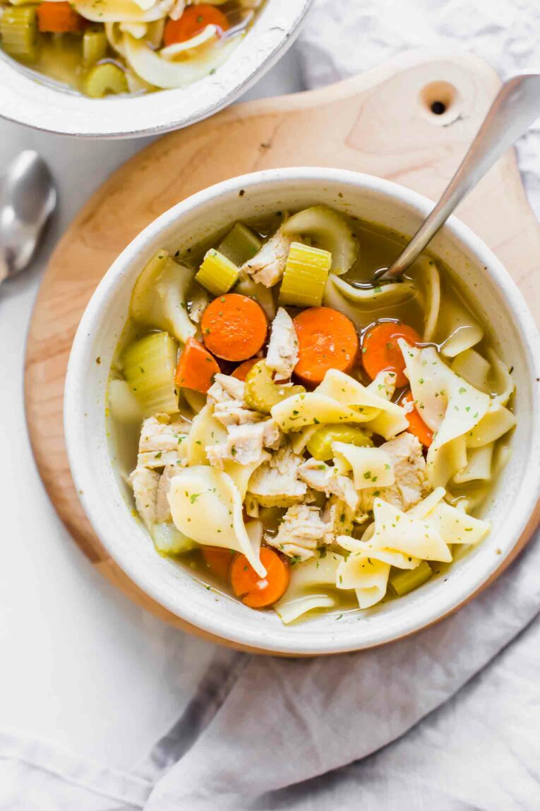 Top shot of slow cooker turkey noodle soup.