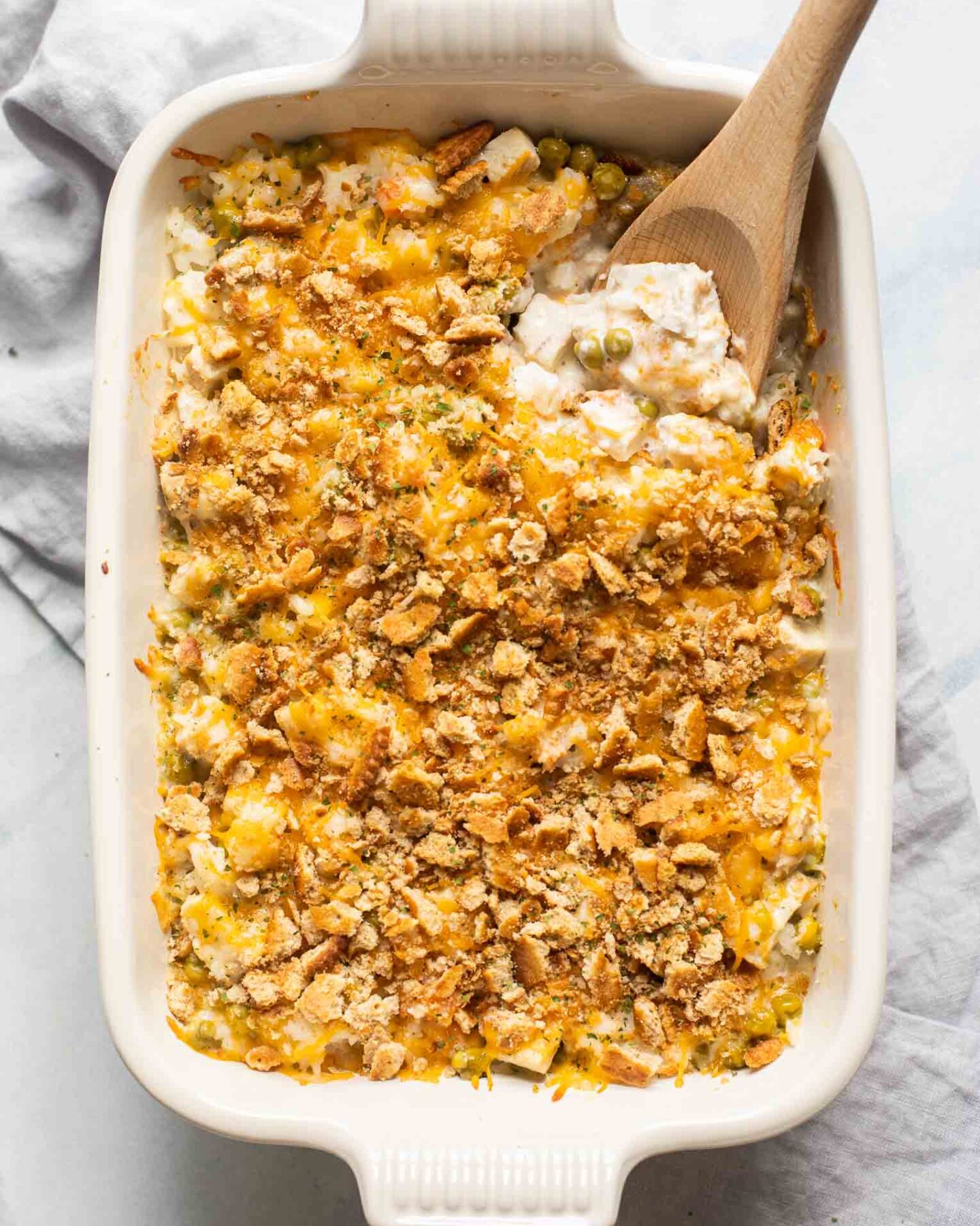 Easy Turkey Rice Casserole with a wooden spoon in the corner.