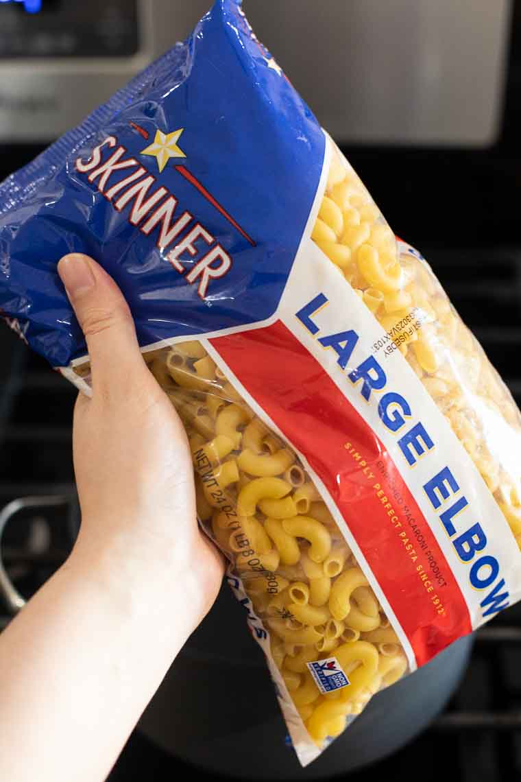 Skinner Large Elbows over a stovetop.