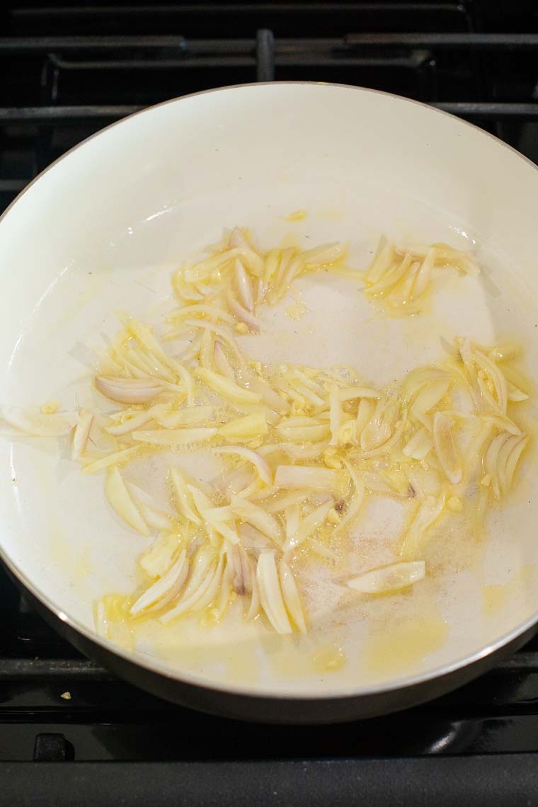 Shallots and garlic cooking in butter.