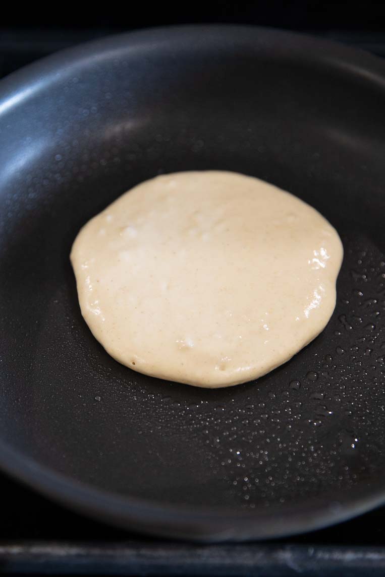 Greek yogurt pancake being cooked.