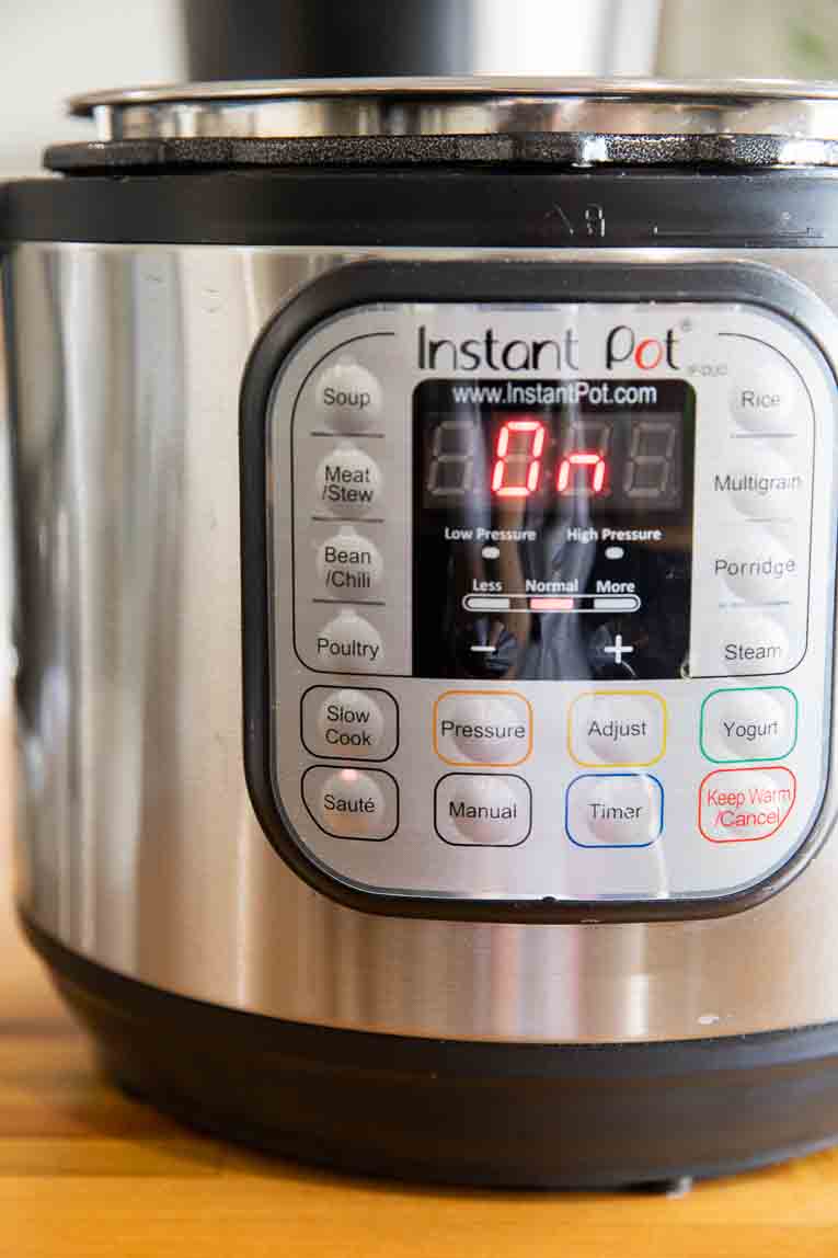 Across shot of Instant Pot on the "Sauté" setting.
