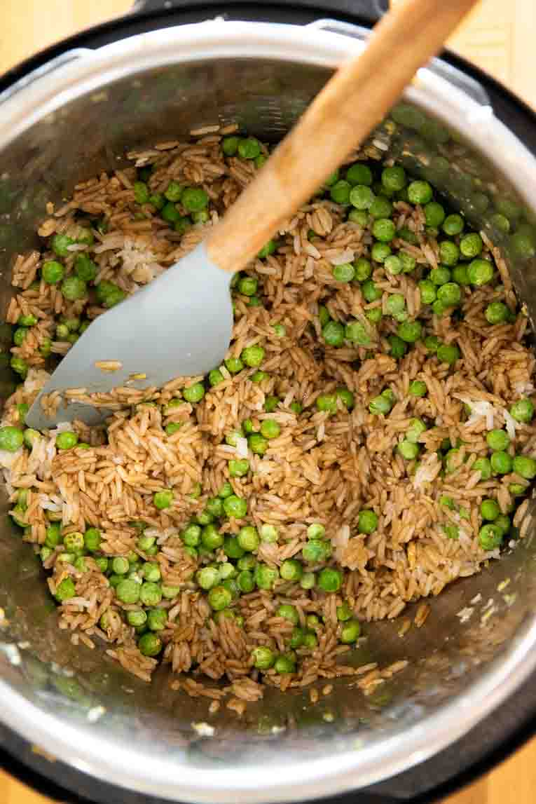 Rice and peas being cooked in an Instant Pot.