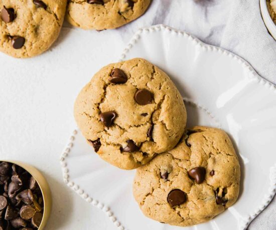 Close up top shot of protein cookies on a white plate.