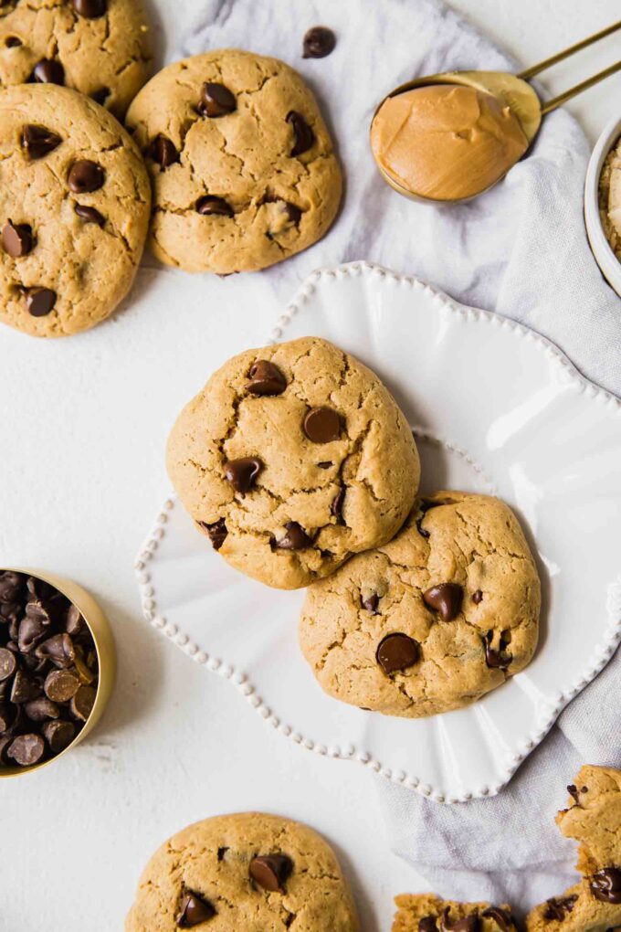 Close up top shot of protein cookies on a white plate.