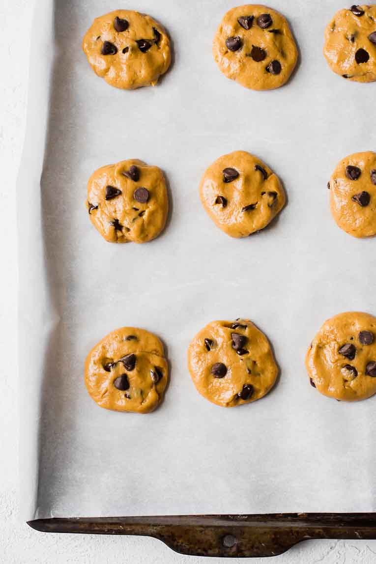 Raw protein cookie dough on a baking sheet.