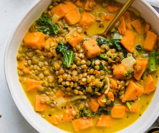 Top shot of Vegetarian Lentil & Sweet Potato Curry Stew in a white bowl.