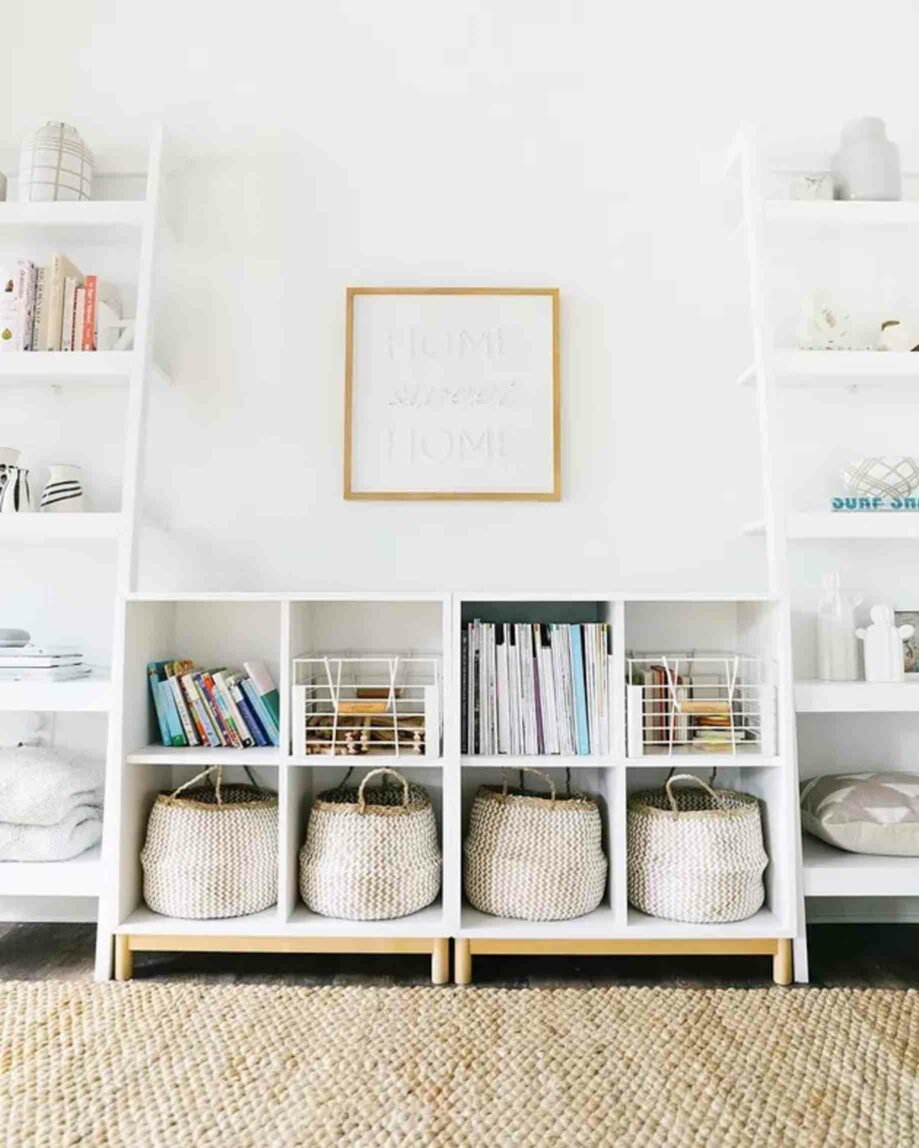 A child's room with baskets and storage areas.