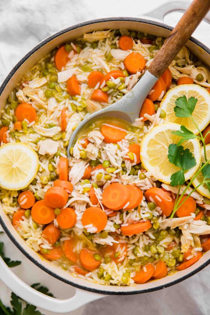 Top shot of Chicken Lemon Rice Soup in a dutch oven.