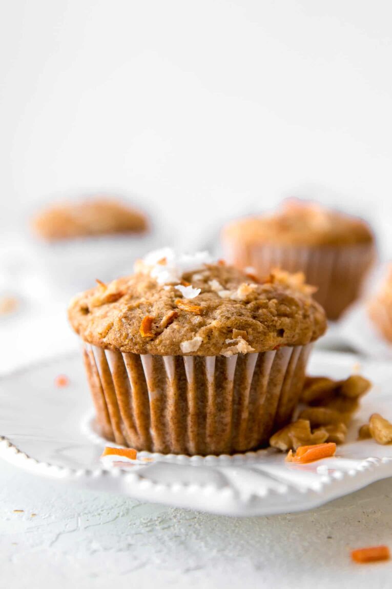 Close up across shot of healthy carrot cake muffin.