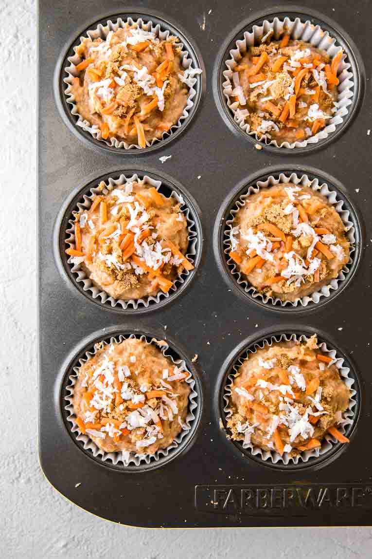 Muffin tin with freshly baked carrot cake muffins.