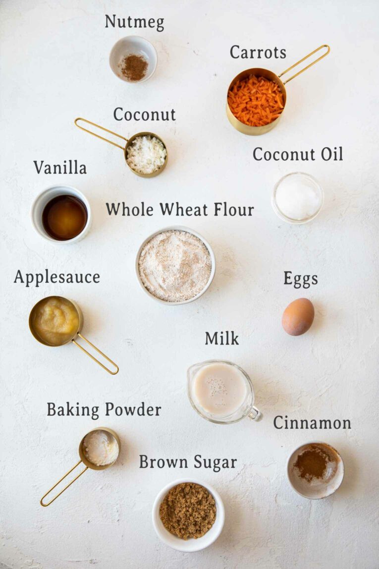 Ingredients for Healthy Carrot Cake Muffins on a marble board.