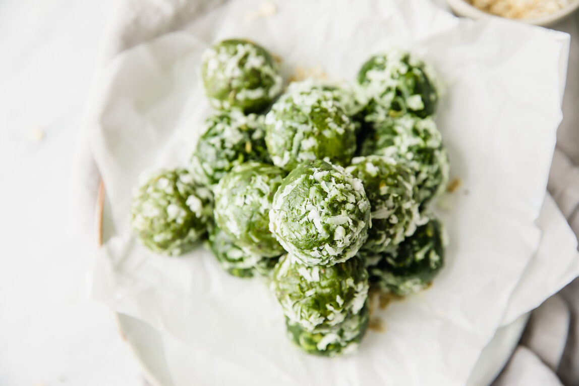 Energy bites piled on a napkin.