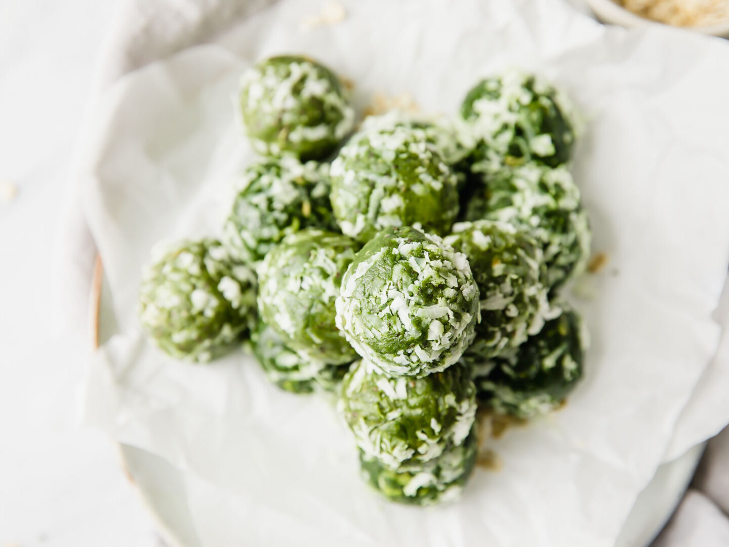 Energy bites piled on a napkin.