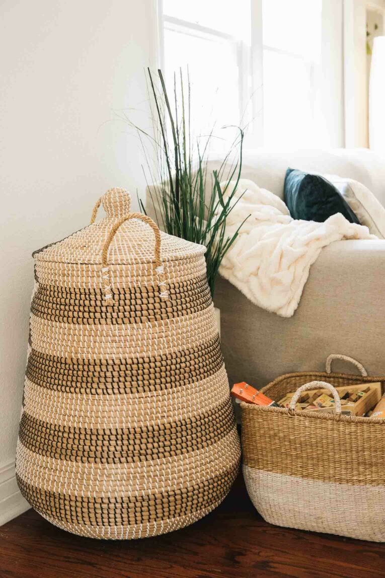 Large baskets for toy storage in the living room.
