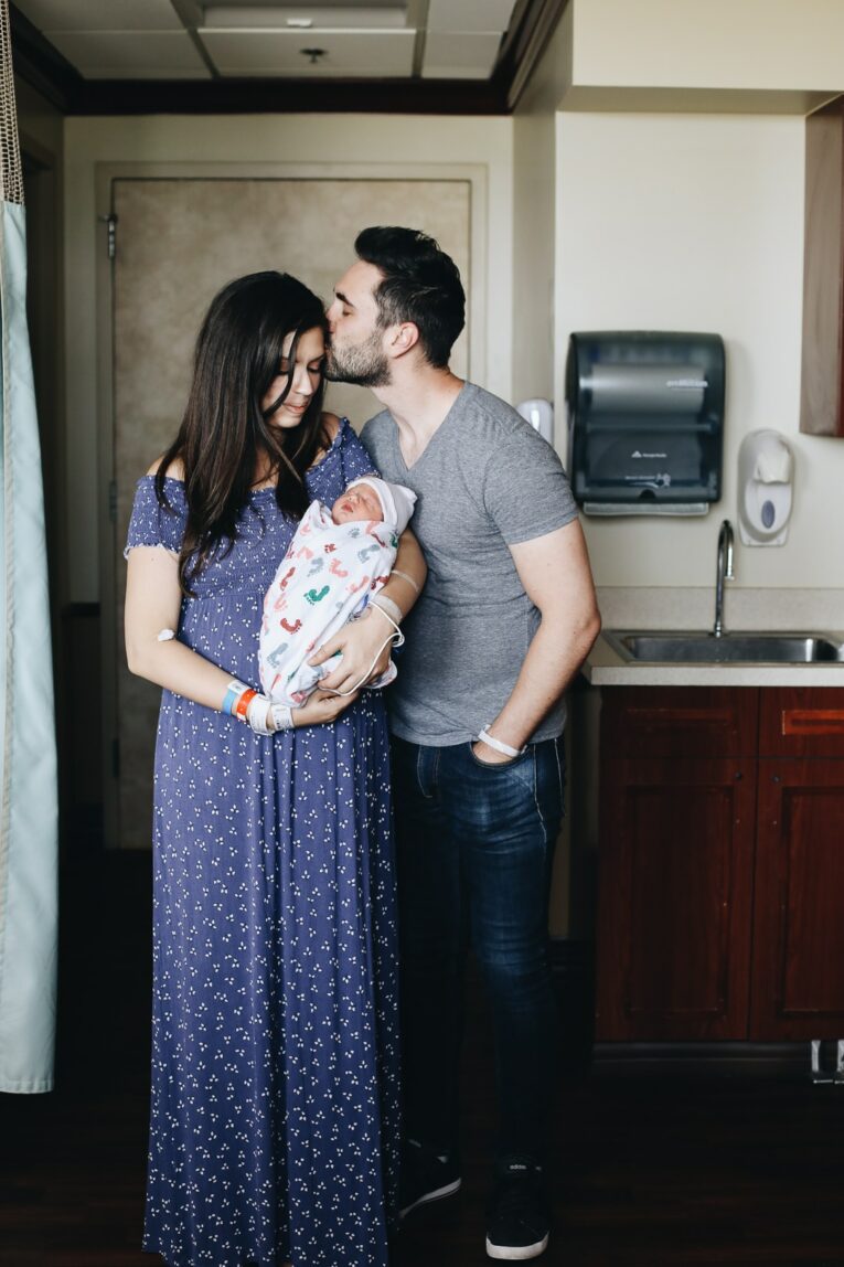 Photo of family in hospital recovering from c-section.