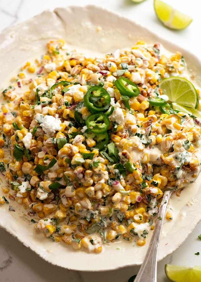 A top shot of mexican corn in a salad.