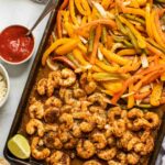 Sheet Pan Shrimp Fajitas on a baking pan.