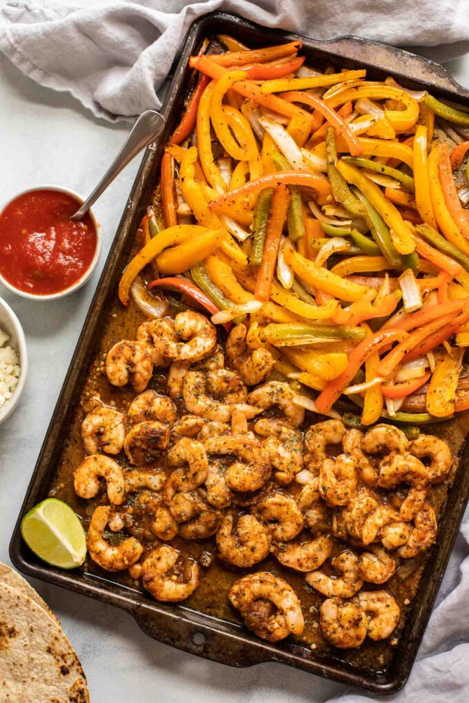 Sheet Pan Shrimp Fajitas on a baking pan.