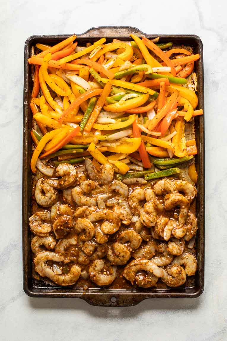 Sheet Pan Shrimp Fajitas getting ready to go in the oven.