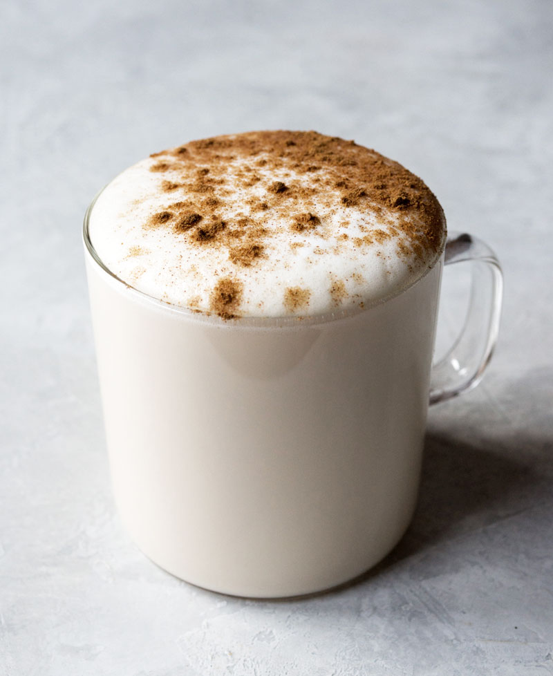A rooibos tea latte on a table.