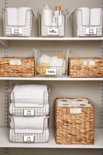 A bathroom closet with organized items.