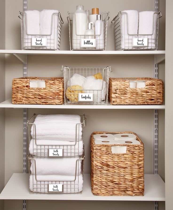 A bathroom closet with organized items.