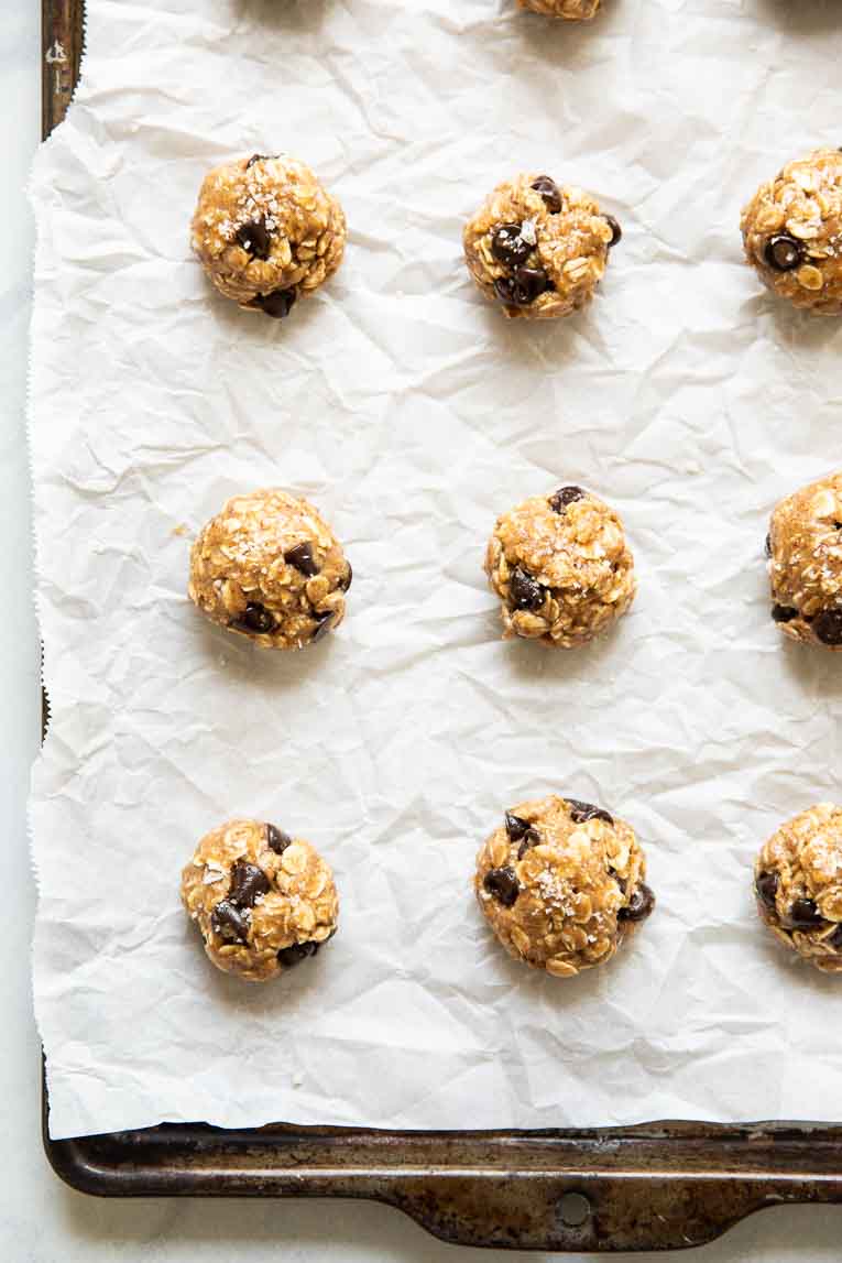 Raw cookie dough on a baking sheet.