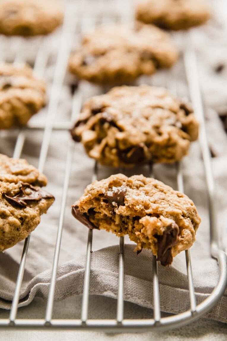 Angled shot of lactation cookies with bite taken out.