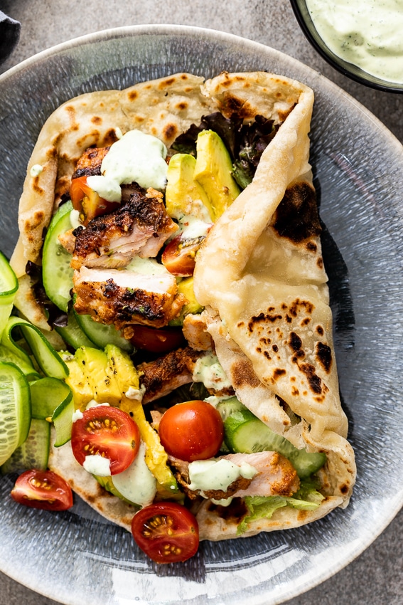 A chicken shawarma flatbread in a bowl. 