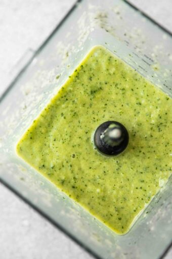 Green smoothie in a blender.