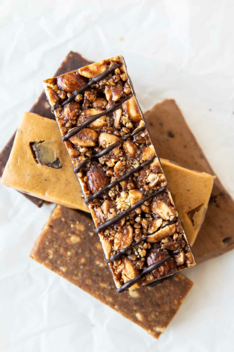 5 protein bars stacked on top of each other.
