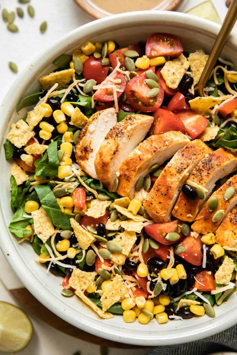 Close up of Chick-Fil-A Spicy Southwest Salad in a white bowl.
