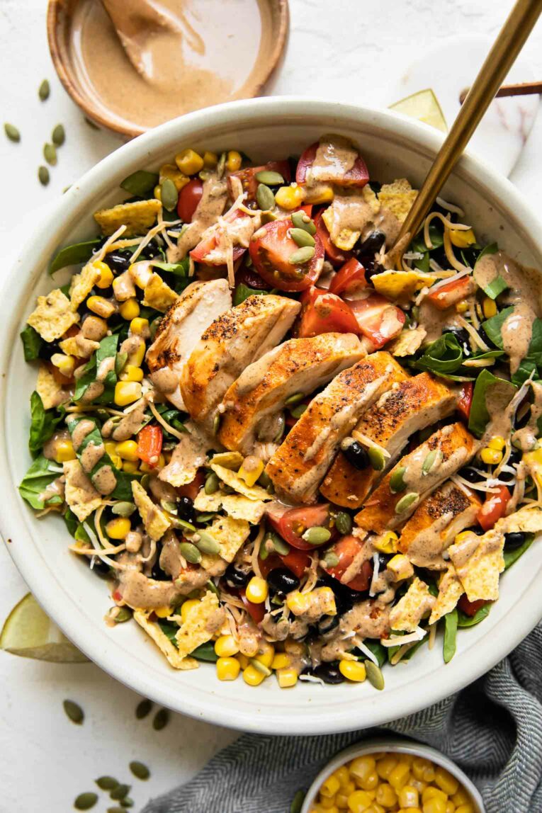 Chick-Fil-A Spicy Southwest Salad in a white bowl with Spicy Southwest dressing.