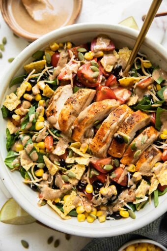 Top shot of Spicy Southwest Salad (Chick-Fil-A Copycat Recipe) in a white bowl.