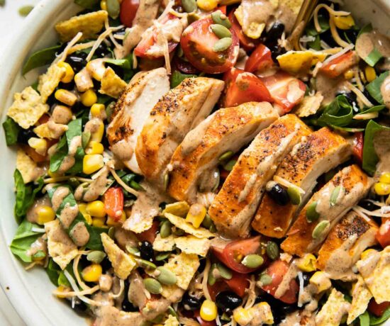 Top shot of Spicy Southwest Salad (Chick-Fil-A Copycat Recipe) in a white bowl.