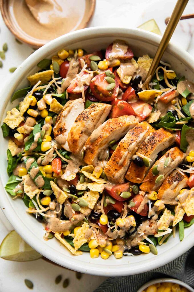 Top shot of Spicy Southwest Salad (Chick-Fil-A Copycat Recipe) in a white bowl.