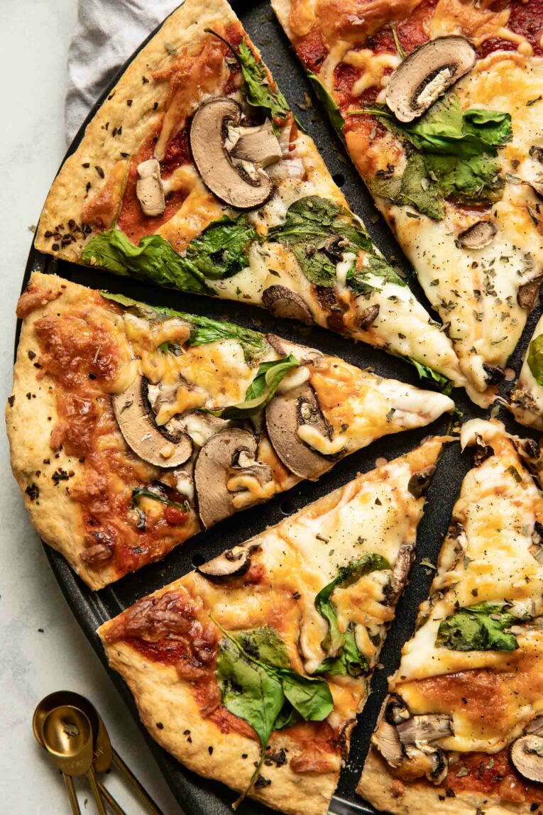 Vegan Pizza sliced in a baking pan.