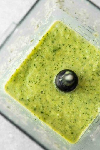 Green smoothie in a blender.