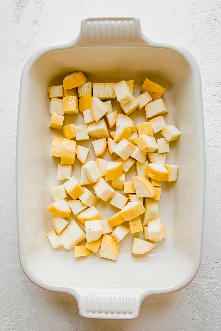 Summer squash in a rectangular casserole dish.