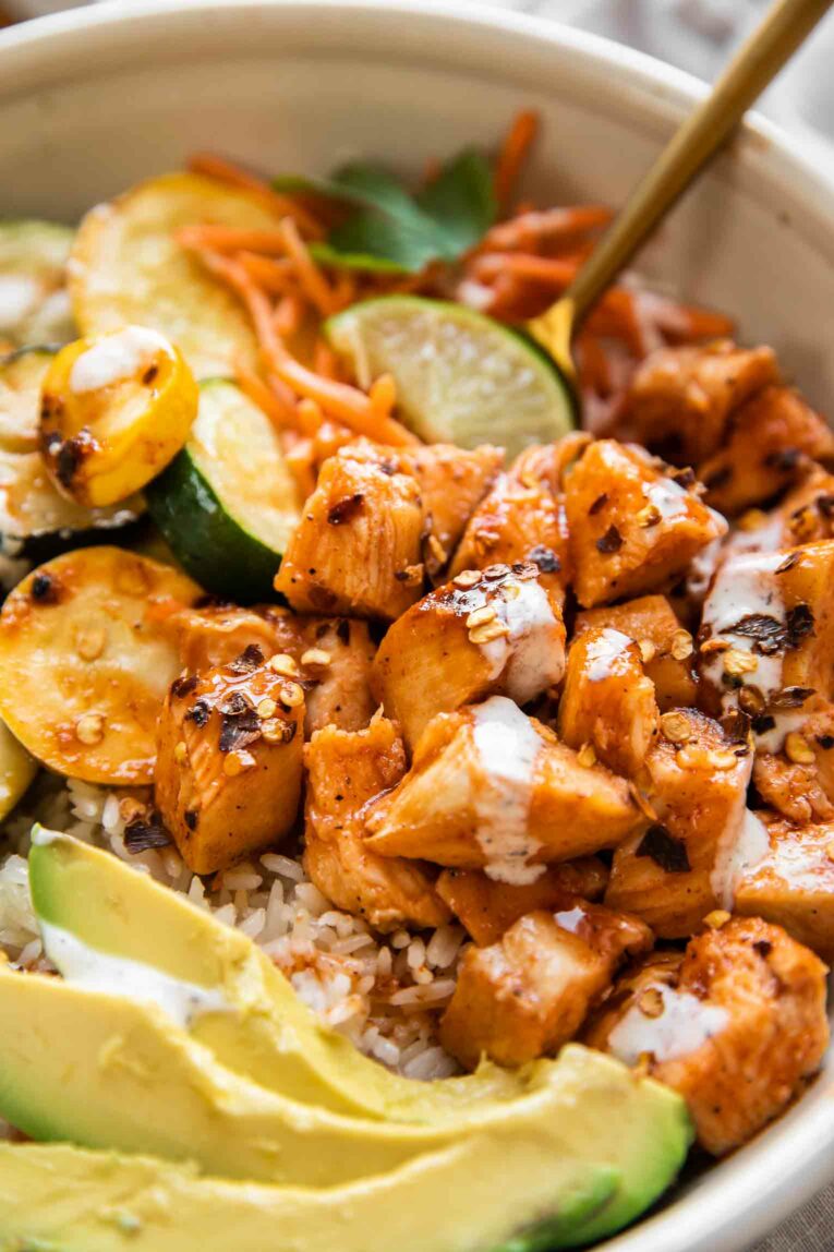 Close up of hot honey chicken with ranch dressing.