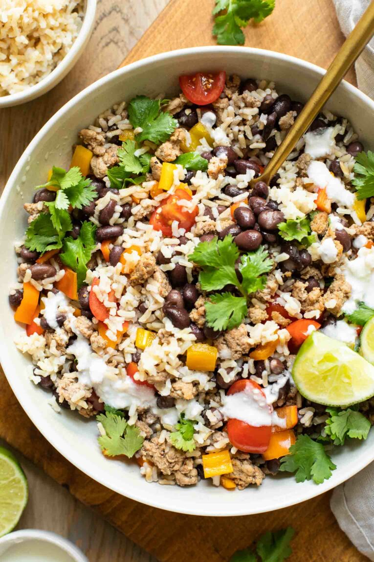 Close up of Taco bowl recipe in a large white bowl.